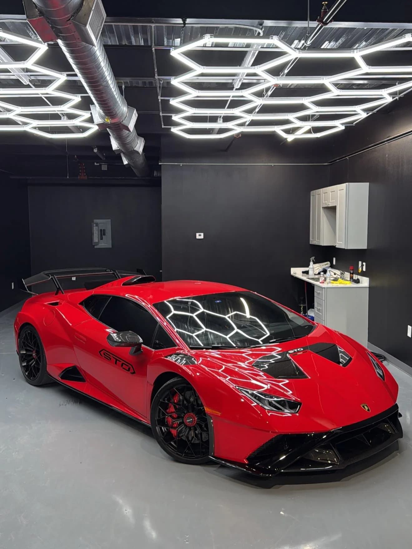 Red Lamborghini Huracán STO in the bay